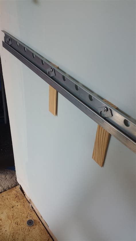 wall hanging cabinet rail height